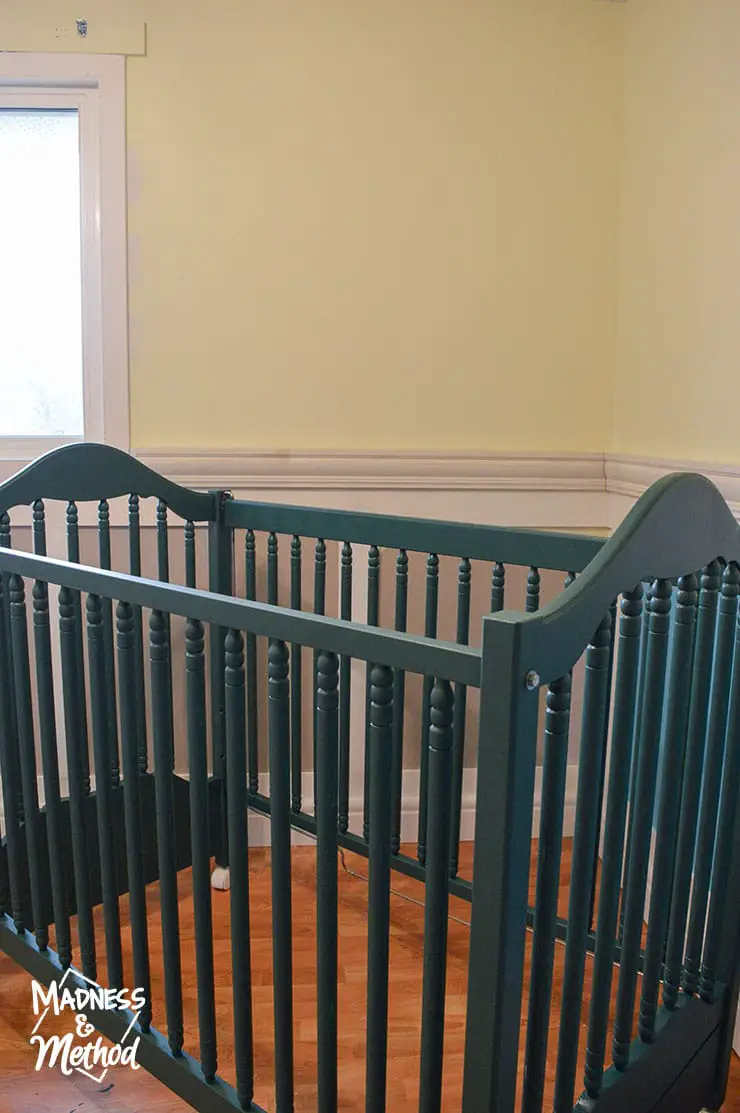 dark teal crib yellow walls