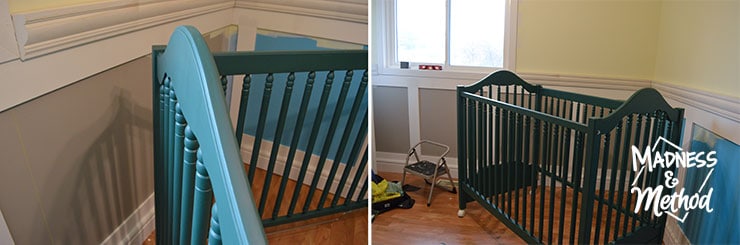 dark teal crib in room