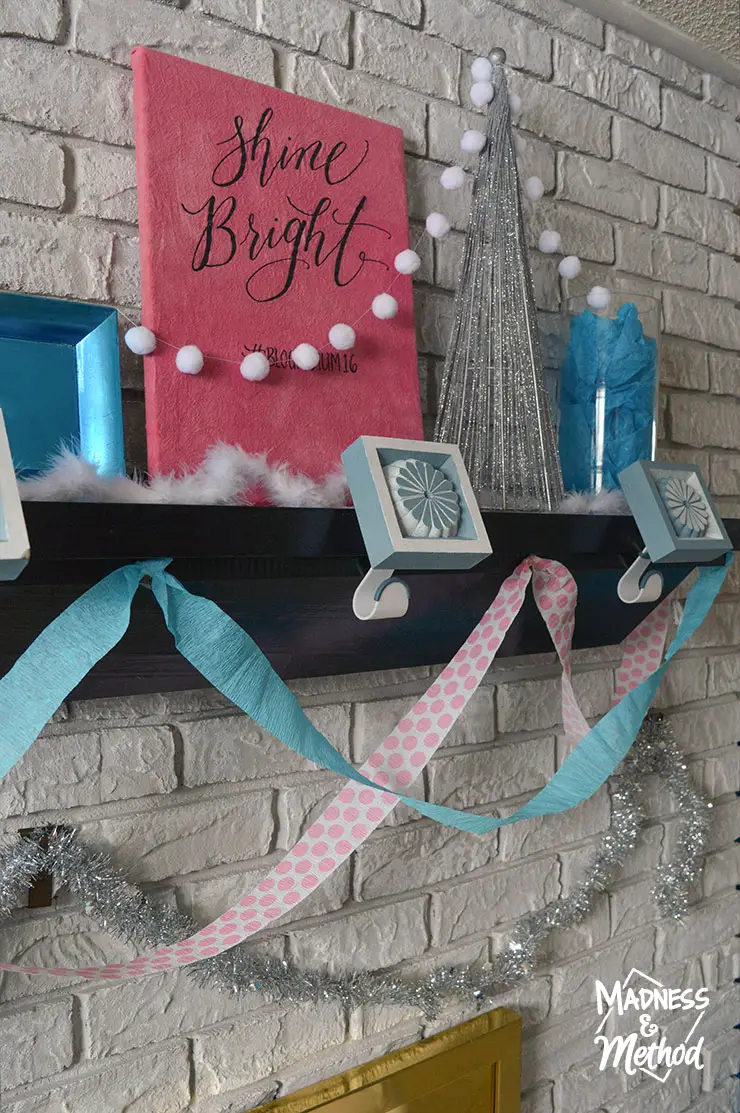 pink and blue mantel decor