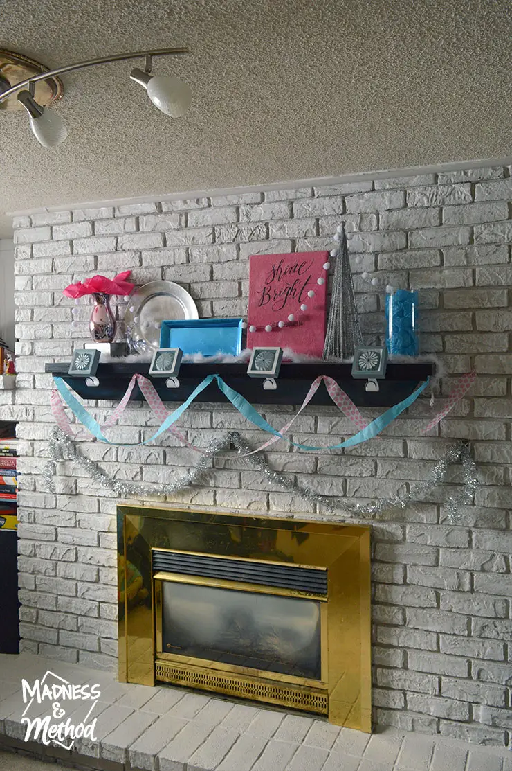pink and blue baby mantel