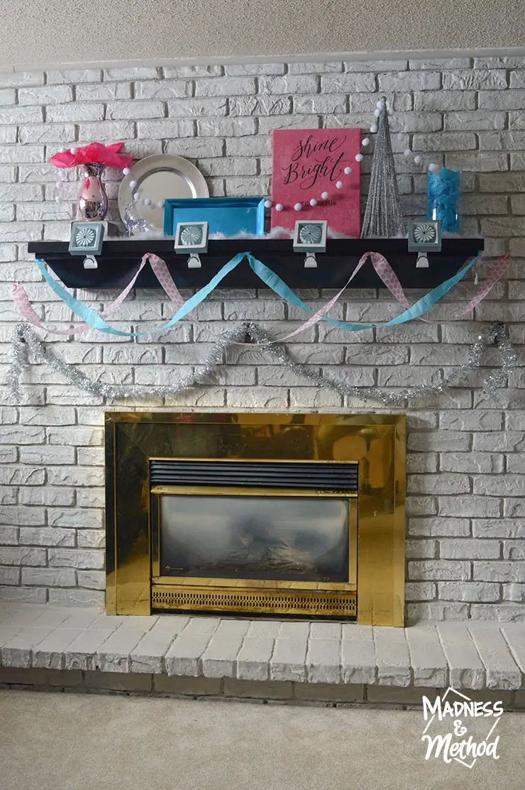 white bricks with pink and blue mantel