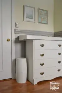 change table in nursery with diaper genie