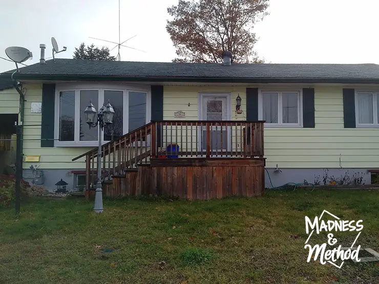 yellow siding bungalow