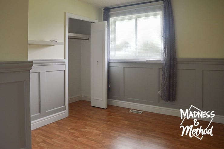 yellow bedroom with grey wainscoting