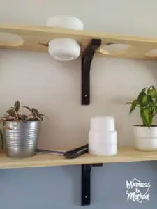 drilling holes into shelves