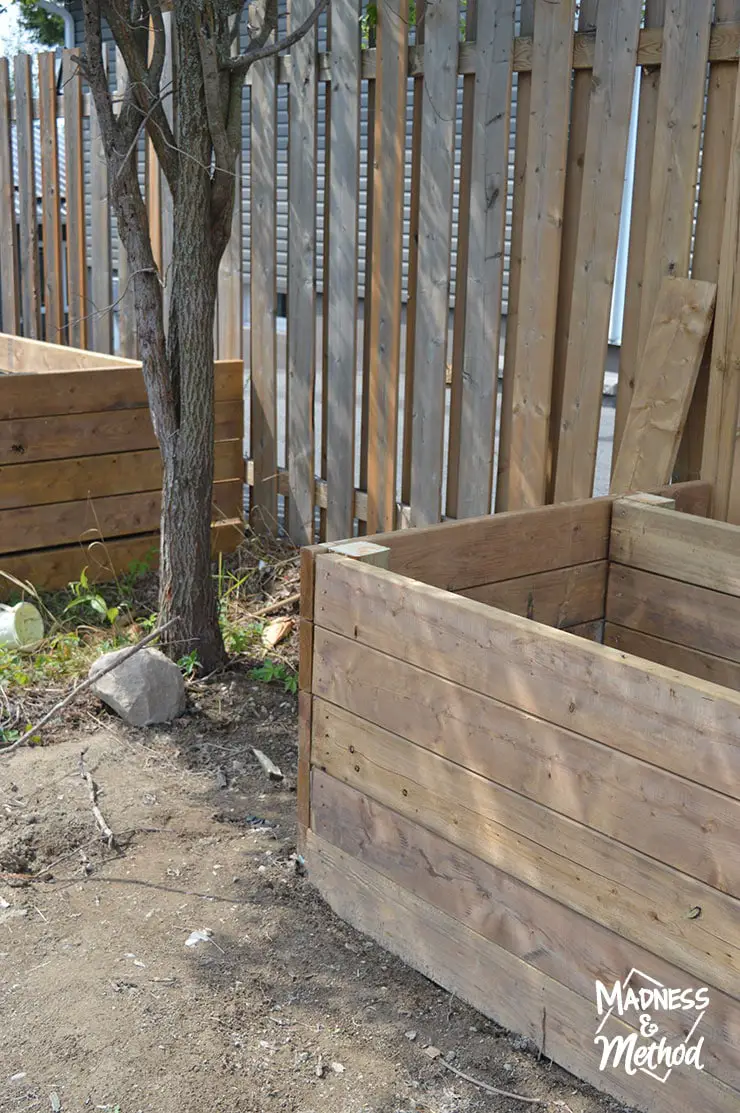 raised garden beds along fence