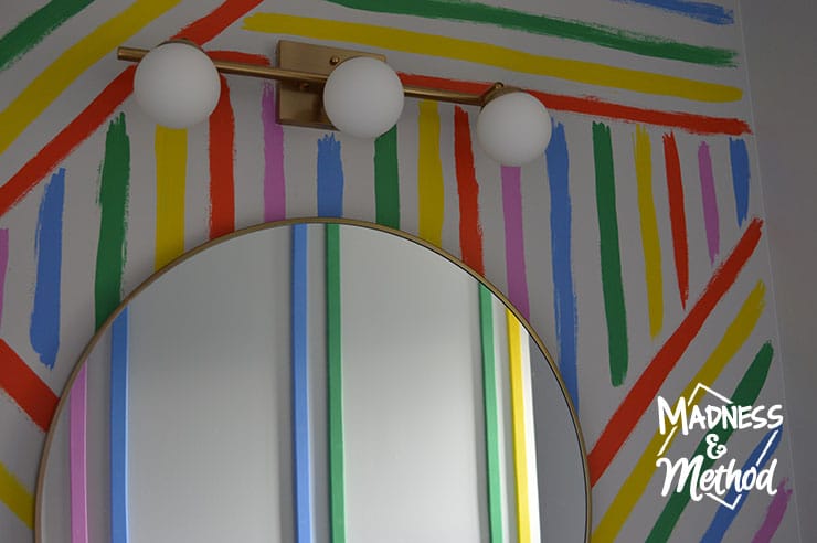 rainbow stripes round mirror