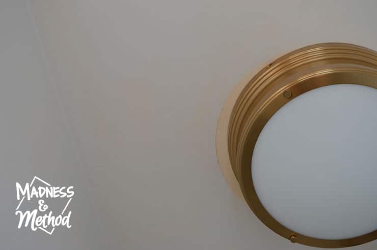 gold flushmount on ceiling