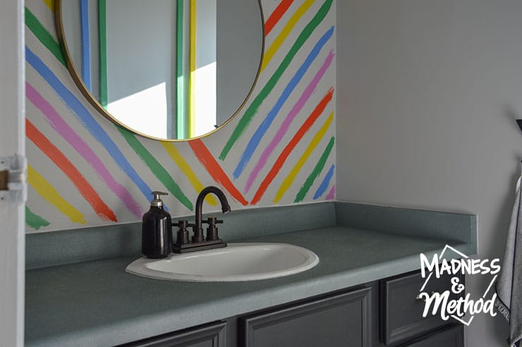 rainbow bathroom accent wall