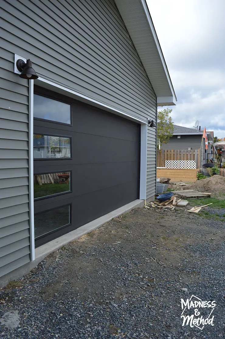 black garage door with windows