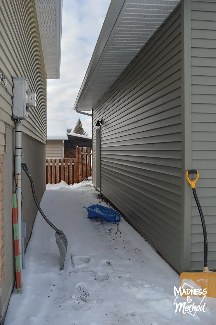 walkway between house and garage in winter