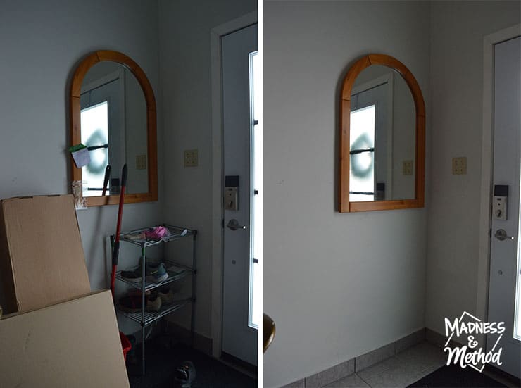 wood arched mirror in entry