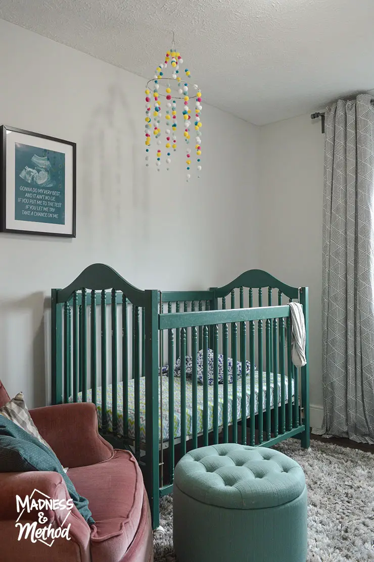 nursery with teal crib