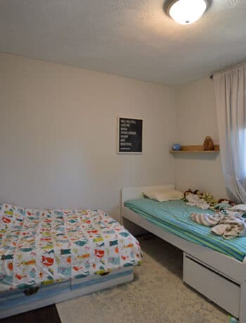 two twin beds in small room