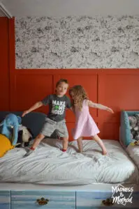 kids dancing on bed