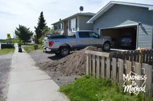 pile of dirt in driveway