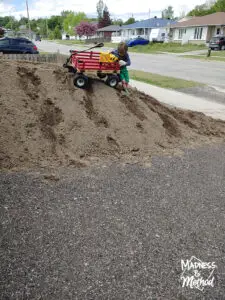 pile of dirt in driveway