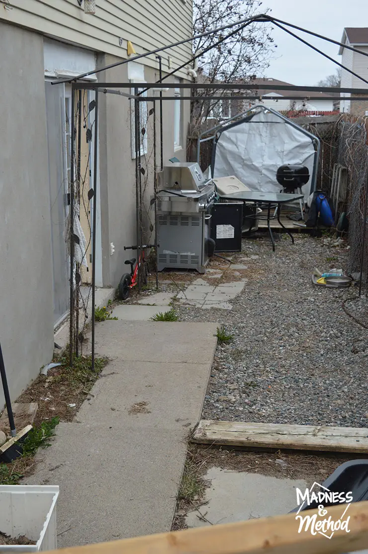 narrow backyard with old gazebo