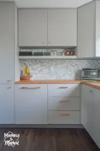 gray cabinets wood counters