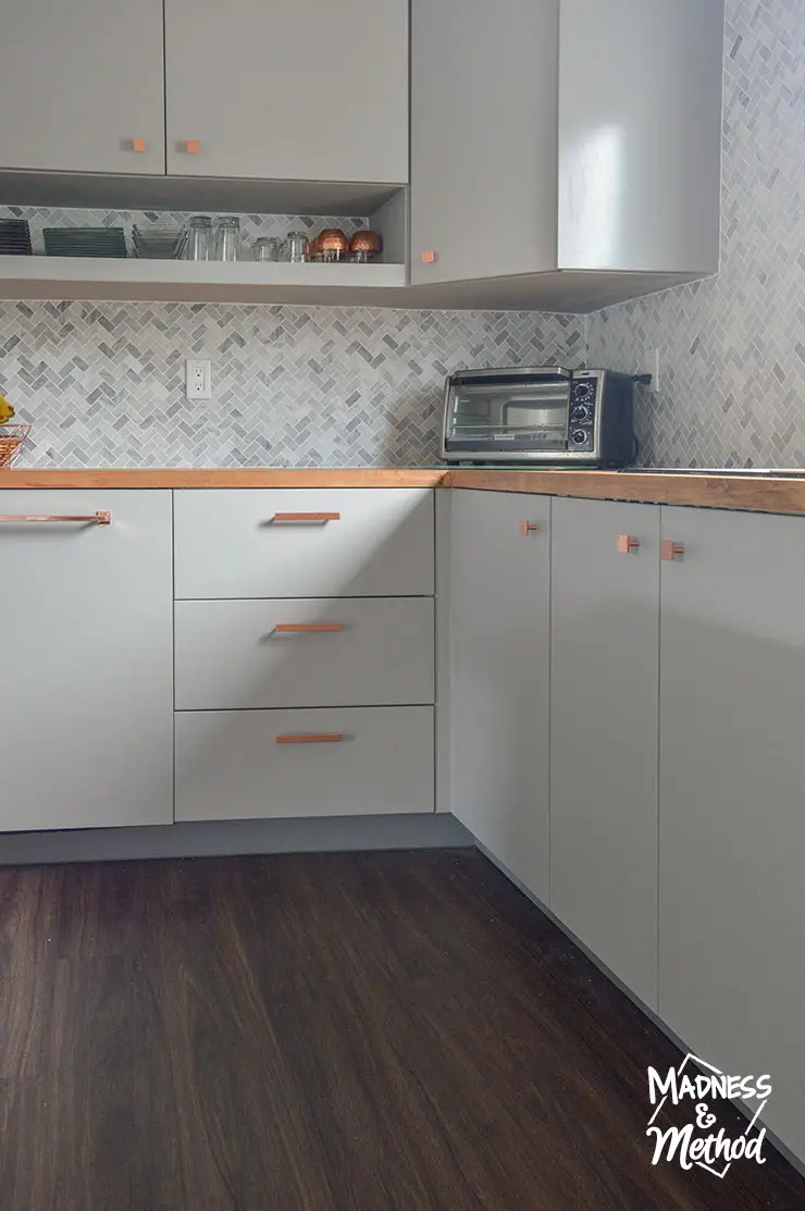 gray cabinets copper handles