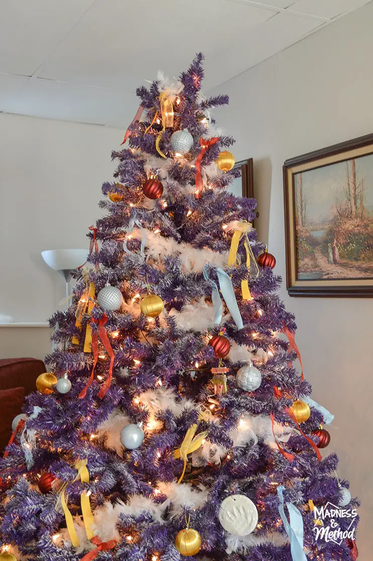 purple christmas tree with bows