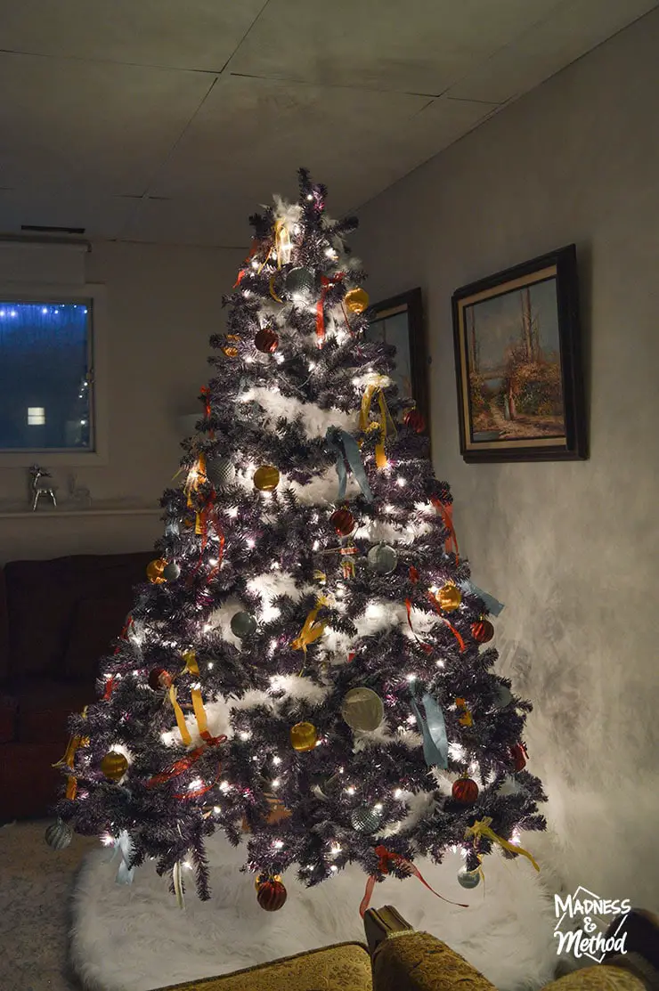 purple christmas tree at night