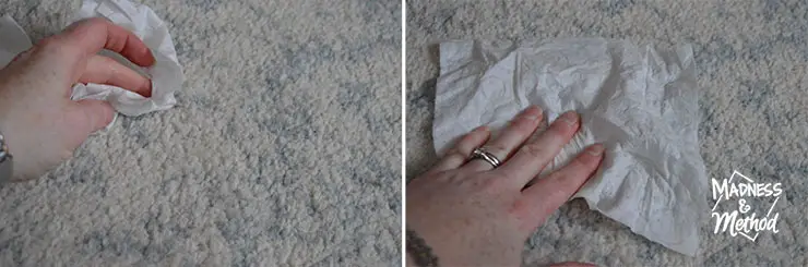 wiping rug with baby wipe