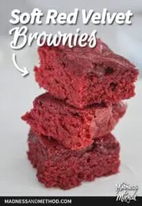 stack of three red brownies with soft red velvet brownies text overlay