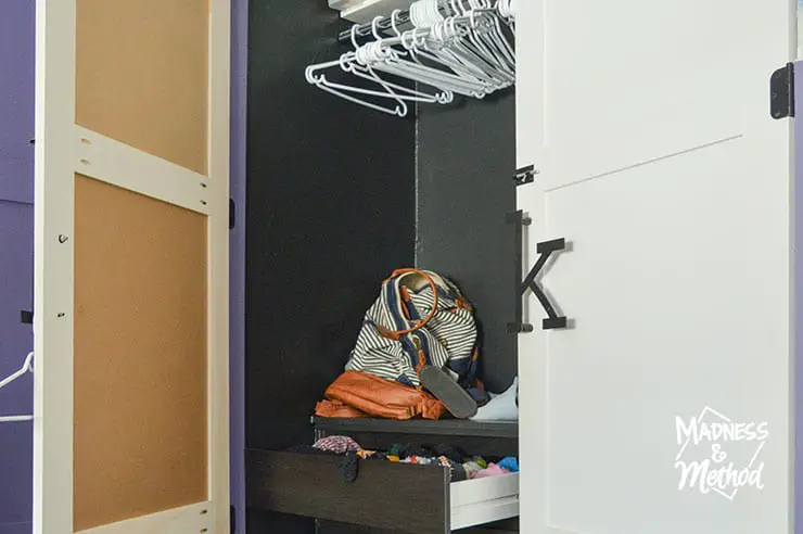 open closet with empty hangers