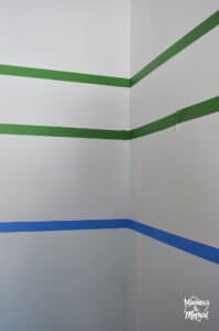 painters tape across a corner with laser level