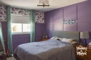 purple primary bedroom with gray bed