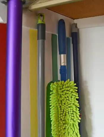 broom handles in closet