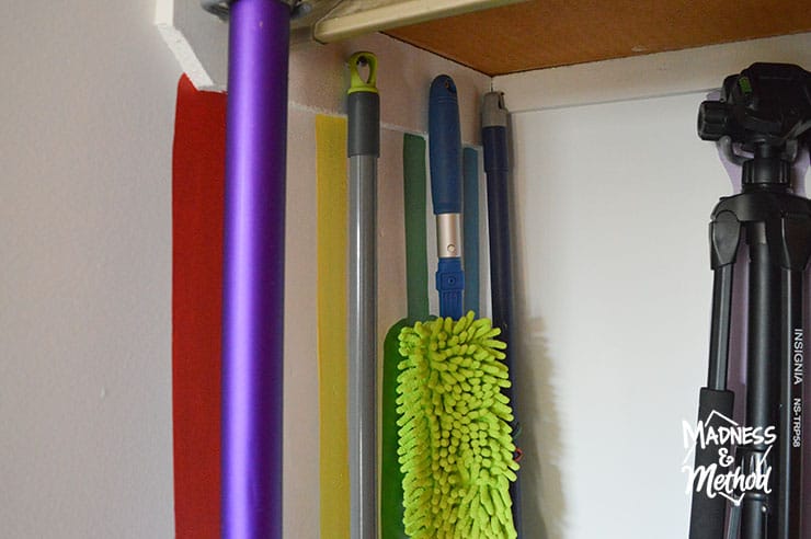 broom handles in closet