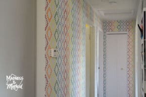 subtle rainbow hallway with white doors