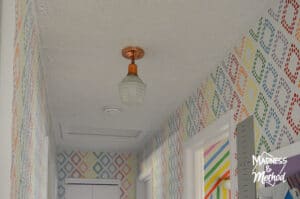 white ceiling and copper fixture