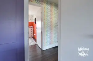 colourful bedrooms into white hallway