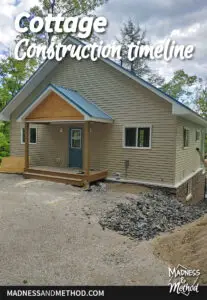 cottage construction timeline text overlay with front of cottage
