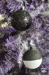 purple christmas tree with black and white balls