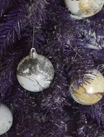 marble look ornaments on purple tree