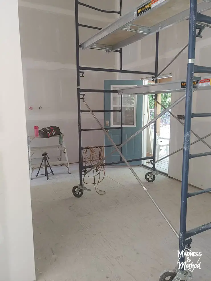 cottage entry with scaffolding