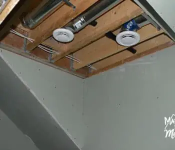 open ceiling in basement bath
