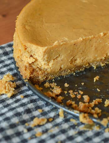 pumpkin pie cheesecake with slice missing