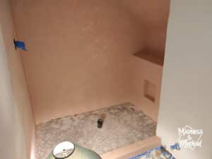 peach microcement walls in shower