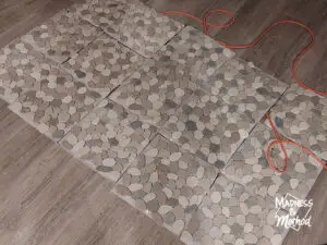laying pebble tiles