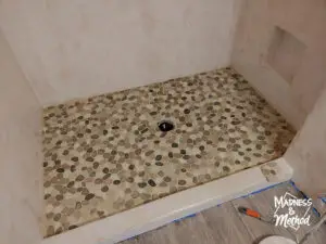 pebble tiles shower floor