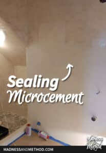 sealing microcement text overlay with in-progress sealer