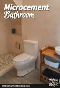 pink microcement bathroom with white toilet