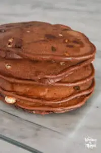 stack of chocolate pancakes no syrup