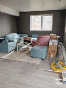 unfinished basement living room dark walls