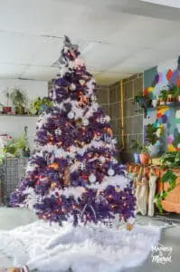 purple christmas tree with white garland
